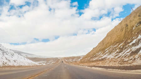 Driving West on mountain highway to Steamboat Springs.の写真素材
