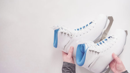 Flat lay. New figure skates on a white background.の写真素材