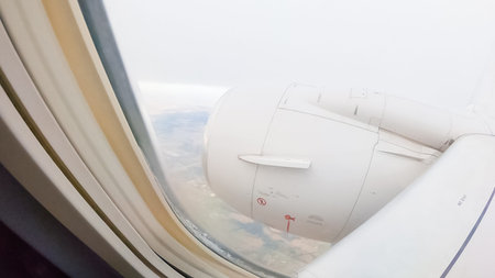 View from the window seat of commercial passenger airplane.