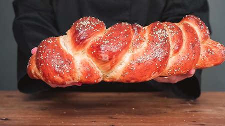 Step by step. Freshly baked shallah bread with sesame and poppy seeds.の写真素材