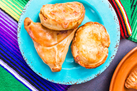 Homemade large empanadas with different staffings.