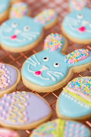 Easter sugar cookies decorated with royal icing of different colors.