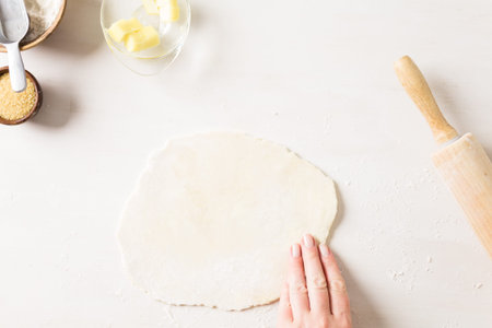 Step by step. Making peach galette with fresh local peaches.の写真素材
