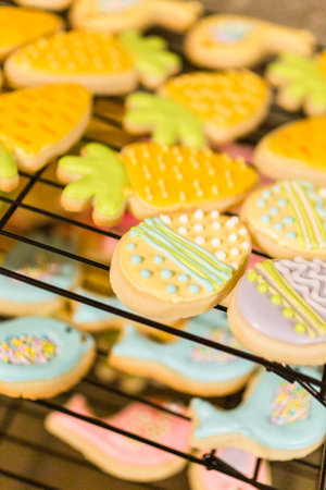 Easter sugar cookies decorated with royal icing of different colors.