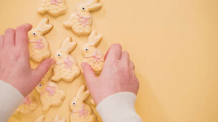 Flat lay. Easter sugar cookies decorated with pastel colors of royal icing.の写真素材