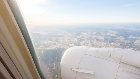 View from the window seat of commercial passenger airplane.
