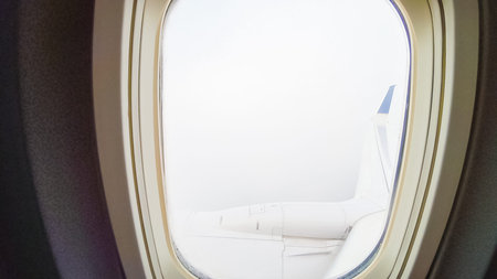 View from the window seat of commercial passenger airplane.