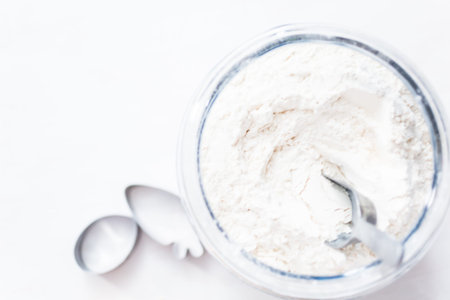 White flour in a large glass jar.