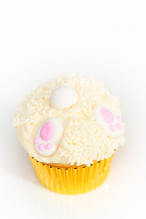 Easter bunny cupcakes on a white background.