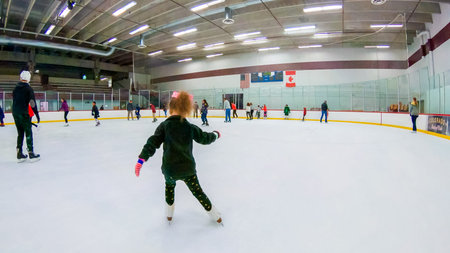 Denver, Colorado, USA-December 16, 2018 - Public ice skating at indoor ice skating rink.のeditorial素材