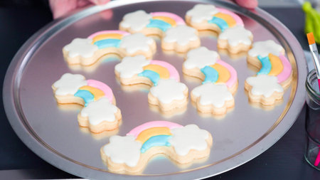 Step by step. Decorating unicorn sugar cookies with royal icing.