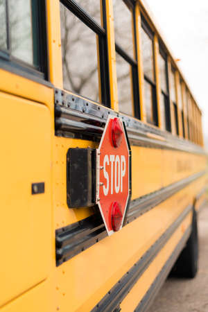 Close ups of yellow school bus on field trip.の写真素材