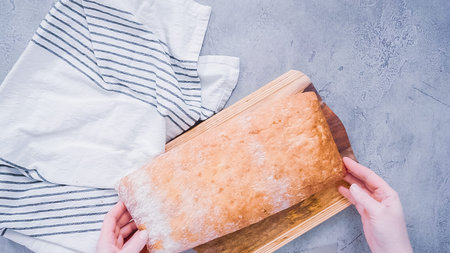 Flat lay. Whole loaf of fresh ciabatta bread.