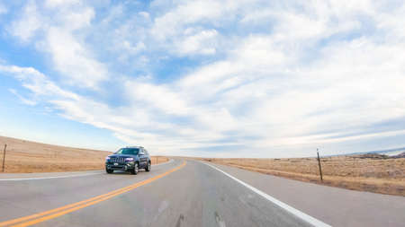 Denver, Colorado, USA-December 26, 2018 - Driving on paved road in rural area.のeditorial素材