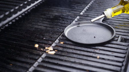 Cooking eggs in cast iron skillet on a gas grill.