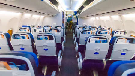 Economy class seats in mid size passenger airplane.のeditorial素材