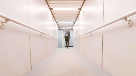 Houston, Texas, USA-January 11, 2019 - Inside of the aircraft bridge connecting airport terminal and passenger aircraft.のeditorial素材