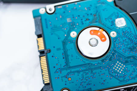 Internal and external solid state hard drives on the table.の写真素材