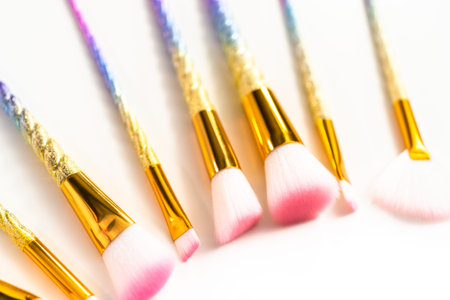 Unicorn-themed makeup brush set on a white background.