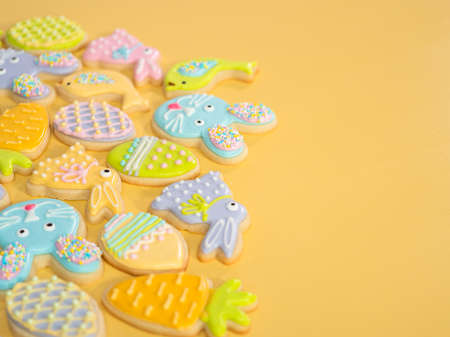 Easter sugar cookies decorated with royal icing of different colors.の写真素材