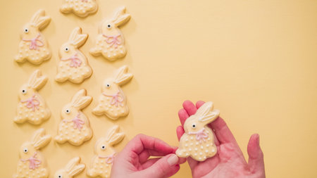 Flat lay. Easter sugar cookies decorated with pastel colors of royal icing.