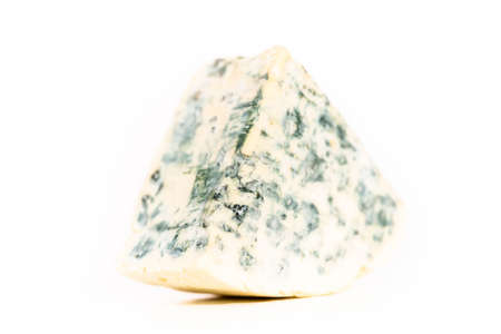 Large slice of blue cheese on a white background.の写真素材