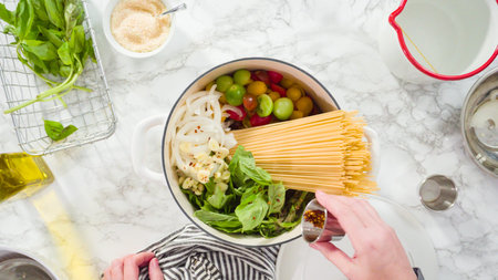 Flat lay. Step by step. Cooking on pot pasta recipe in an enameled cast iron dutch oven.の写真素材