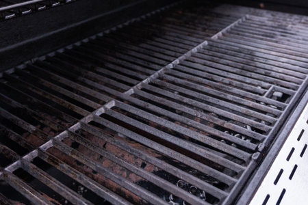 Clean six-burner gas grill ready for summer grilling.