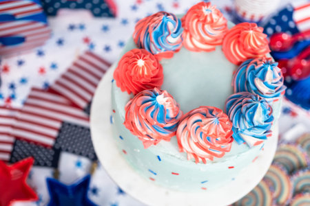 Cake, cookies, and fruit and vegetable snack tray at the July 4th celebration party.