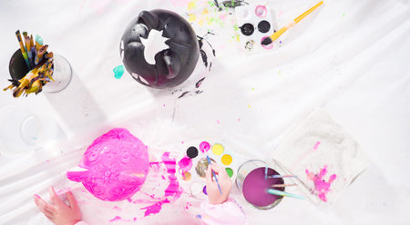 Flat lay. Painting craft pumpkin with acrylic paint for Halloween.
