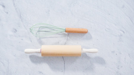 Flat lay. Silicone cooking utensils with wooden handle.