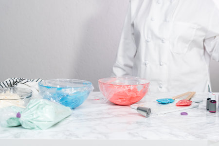 Making buttercream frosting for decorating a vanilla cake.の写真素材