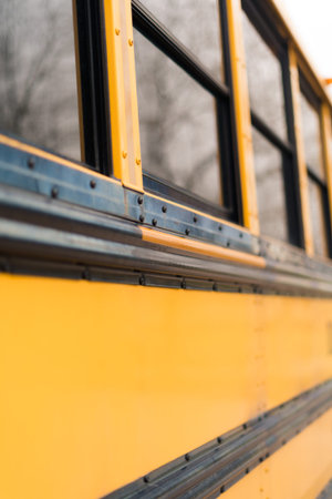 Close ups of yellow school bus on field trip.