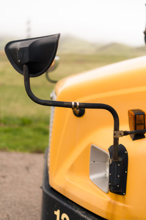 Close ups of yellow school bus on field trip.