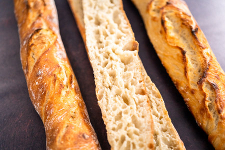 Freshly baked small French baguette bread.の写真素材