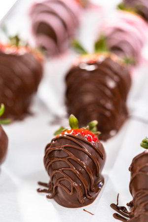Chocolate dipped strawberries drizzled with melted chocolate.の写真素材