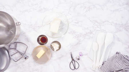 Flat lay. Step by step. Ingredient to bake red velvet cupcakes.の写真素材