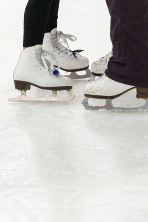 View of a figure skater and her coach feet at the figure skating practice.の写真素材