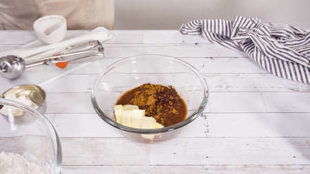 Mixing ingredients to bake chocolate raspberry cupcakes.の写真素材