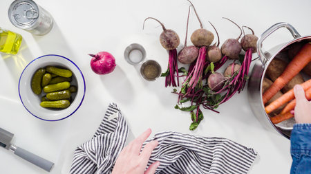 Flat lay. Step by step. Ingredients to prepare vinaigrette salad on the ocunter.の写真素材