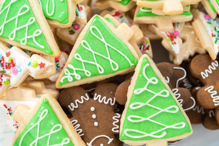 Gingerbread and sugar Christmas cookies with royal icing.の写真素材