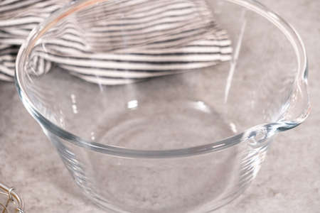 Mixing ingredients into the batter for lemon pound cake.の写真素材