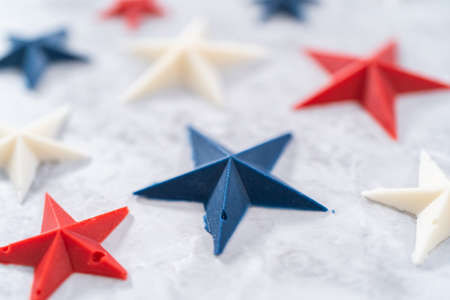 Homemade color chocolate stars that are made from color chocolate molds.の写真素材