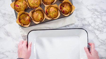 Flat lay. Step by step. Cooling freshly baked cranberry muffins.
