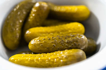 Ingredients to prepare vinaigrette salad on the ocunter.の写真素材