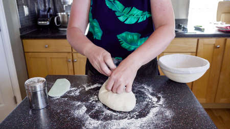 Step by step. Baking sourdough bread in residential kitchen.の写真素材
