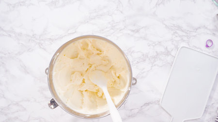 Flat lay. Step by step. Mixing ingredients in a standing kitchen mixer to prepare cream cheese...