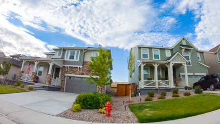 View of the typical suburban neighborhood on a summer morning.のeditorial素材