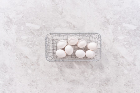 Flat lay. Ingredients for preparing unicorn theme meringue pops on the counter.