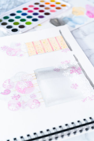 Baker is designing a birthday cake for a little girl's birthday party.